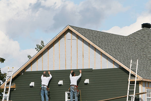 Professional Siding technician working in Lawrenceville, GA